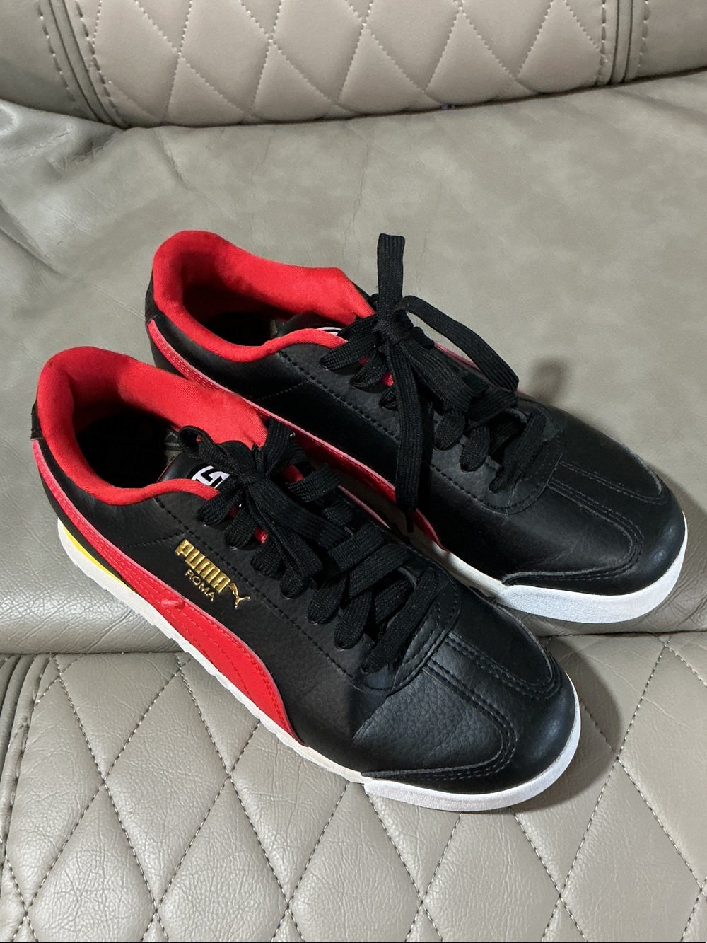 Puma Black Sneakers with Red Accents